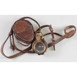 WW1 unmarked officers compass in its 1926 brown leather case.