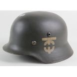 German M35 steel helmet with liner and chin strap, side decal for OT Org.Todt who fought as foot