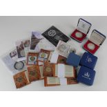 GB & World Commems: 4x Royal Mint cased silver proofs, a Denmark BU set, a coin cover, 3x world