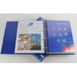 Euro Collector album containing 12 sets of BU Euro coins of various nations.