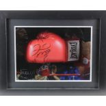 Undefeated multiple World Boxing Champion Floyd Mayweather signed glove housed in a large box