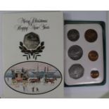 Isle of Man Christmas 50p 1980 cupro-nickel 'diamond finish' BU in card, plus Isle of Man Decimal