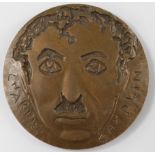 Bronze medallion of Charle Chaplin of c.72mm., obverse:- Incuse bust of Chaplin facing, reverse:-