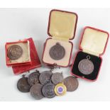 Royal Life Saving Society Medals, several cased (x13)