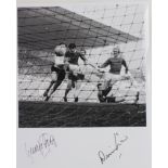 Manchester United black and white action 10 x 8" Photo signed by George Best and Dennis Law