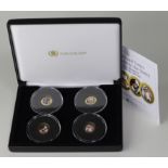 Queen Elizabeth II "Lifes & Times of " Gold Proof set. The four medallion set struck in 9ct gold