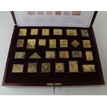 Silver Stamp set "The Empire Collection" a set of 25 silver gilt stamps in a plush red box. Heavy
