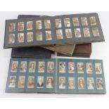 Cigarette cards in vintage albums (x5) sets and part sets, inc First Aid, Motor Cycles, Celebrated