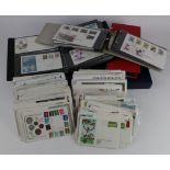 GB FDC's in large box, housing 3x albums and loose. Plus 2x Post office Millennium Collections of