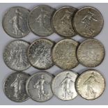 France Silver Coins (12) 1960s mostly 5 Francs, mixed grade including high grade.