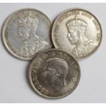 Canada Dollars (3): 1935 GVF scratches, 1936 VF, and 1937 aEF, hairlines.