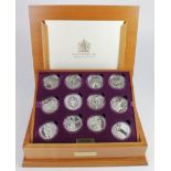 Queen Elizabeth II Golden Jubilee Collection. The 24 coin set of Silver Crown-sized coins from