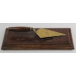 Masonic brass & wooden handled trowel on stand