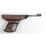 Air pistol by Domini of Italy. Cal .177. Barrel 7". Contoured grip. In good w/order. Paint worn,