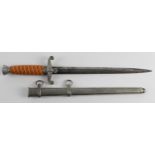 German Whermacht Officers dagger, orange grip, possibly some replacement parts, blade slight