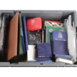 Stacker box containg an assortment of mainly post 1960 world mint sets, boxed items etc, includes