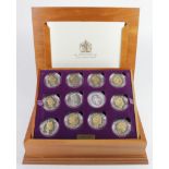 Queen Elizabeth II Golden Jubilee Collection. The 24 coin set of Silver Crown-sized coins from