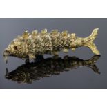 Large 9ct gold pendant in the form of a fish. Length 75mm, weight 24.5g