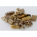 Quantity of 9ct charms, total weight approx 64.2g