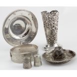 Mixed lot of five silver items comprising a small bottle holder, Mexican hat, bangle, dish,
