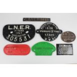 Railway interest. A collecton of seven cast iron plates / plaques, including wagon plates 'L.N.E.