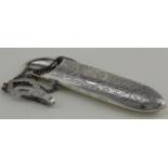Edwardian silver glasses case with engraved decoration, suspension chain and belt clip. Hallmarked