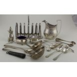 Silver. A collection of silver items, including a George III cream jug (repaired), three piece