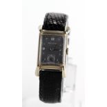 Gents Bulova 14ct cased wristwatch circa 1930s The rectangular grey dial with arabic / square