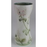 Moorcroft / Liberty & Co., A Moorcroft vase made for Liberty & Co., with floral decoration on a