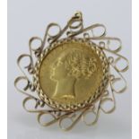 Victorian shieldback sovereign dated 1863 in an ornate 9ct pendant mount, total weight 12.3g