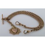 9ct gold "T" bar pocket watch chain with 9ct fob attached. Approx length 38cm, total weight 43.3g
