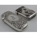 Two vesta cases, comprising a French silver plated example with a profile of Henry IV on it, and