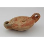 Roman circa 100 AD terracotta oil lamp with marker's mark, 115mm