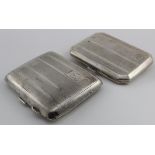 Two silver engine turned cigarette cases - hallmarked Birm 1926 and Chester, 1934. Weight of both