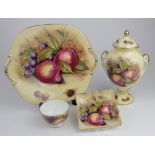 Aynsley. Four items by Aynsley, comprising twin handled vase with cover, oval plate, square dish &