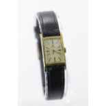 Ladies gold plated Omega wristwatch circa 1966. The rectangular dial with gilt baton markers on an
