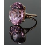 14ct rose gold single stone ring set with natural oval Brazillian Kunzite weighing 25.03ct. Finger