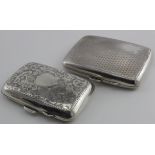 Two silver cigarette cases hallmarked Birm, 1921 and Birm 1929. Weight of both 3.5oz approx.