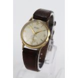 Gents 9ct gold cased Accurist wristwatch on a leather strap. Watch working when catalogued