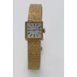 Ladies Movado wristwatch. The square dial with gilt baton markers in a 18ct case on an integral 18ct