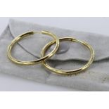 Pair of 14ct hoop earrings, weight 13g