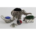 Silver pin cushion, in the form of a pig, hallmarked 'Birmingham 1908', length 57mm approx.,