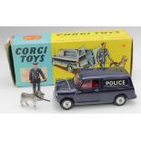 Corgi Toys, no. 448, B.M.C. Mini Police Van with Tracker Dog, police man, dog and insert present,