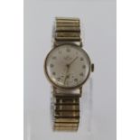 Gents 9ct gold cased "Smiths Deluxe" wristwatch. The cream dial with arabic numerals and