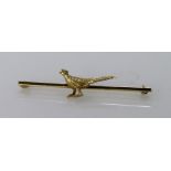 Hallmarked 9ct bar brooch depicting a pheasant, approx 2.8g