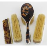 Three tortoise-shell (probably) & silver brushes - all hallmarked W.A. Birm., 1927 + a base metal