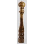 Large turned oak restaurant pepper grinder, height 70cm approx.
