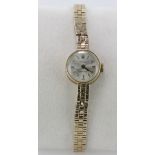 Ladies Rolex Precision 9ct yellow gold wristwatch circa 1964, the silvered dial with gilt baton