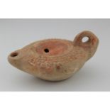 Roman circa 200 AD terracotta oil lamp depicting male bust, 100mm