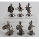 Six Hong Kong sterling silver place name card holders, each depicting a Chinese figure with a